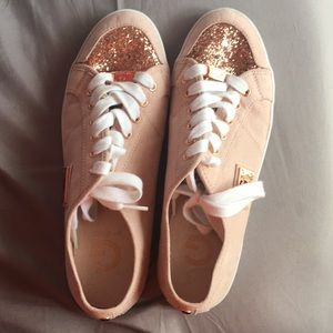 Pink sparkly guess shoes.